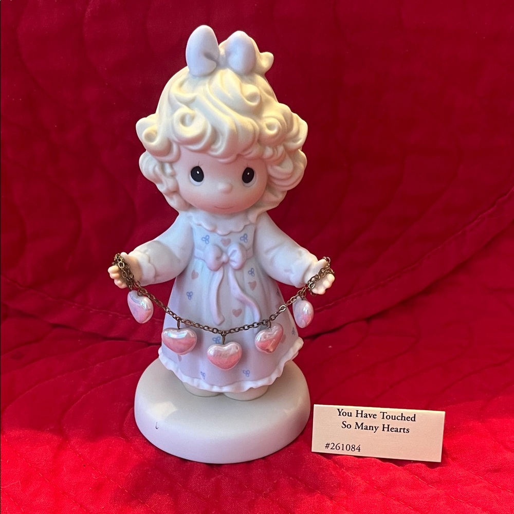 Precious Moments Figurine with Pink and White Accents